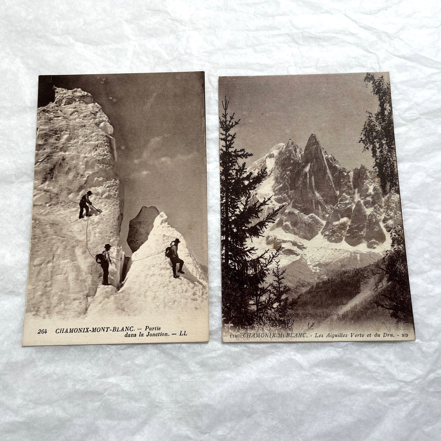 1910s French postcard lot of Chamonix-Mont-Blanc with mountaineers on snow and views of alpine peaks.