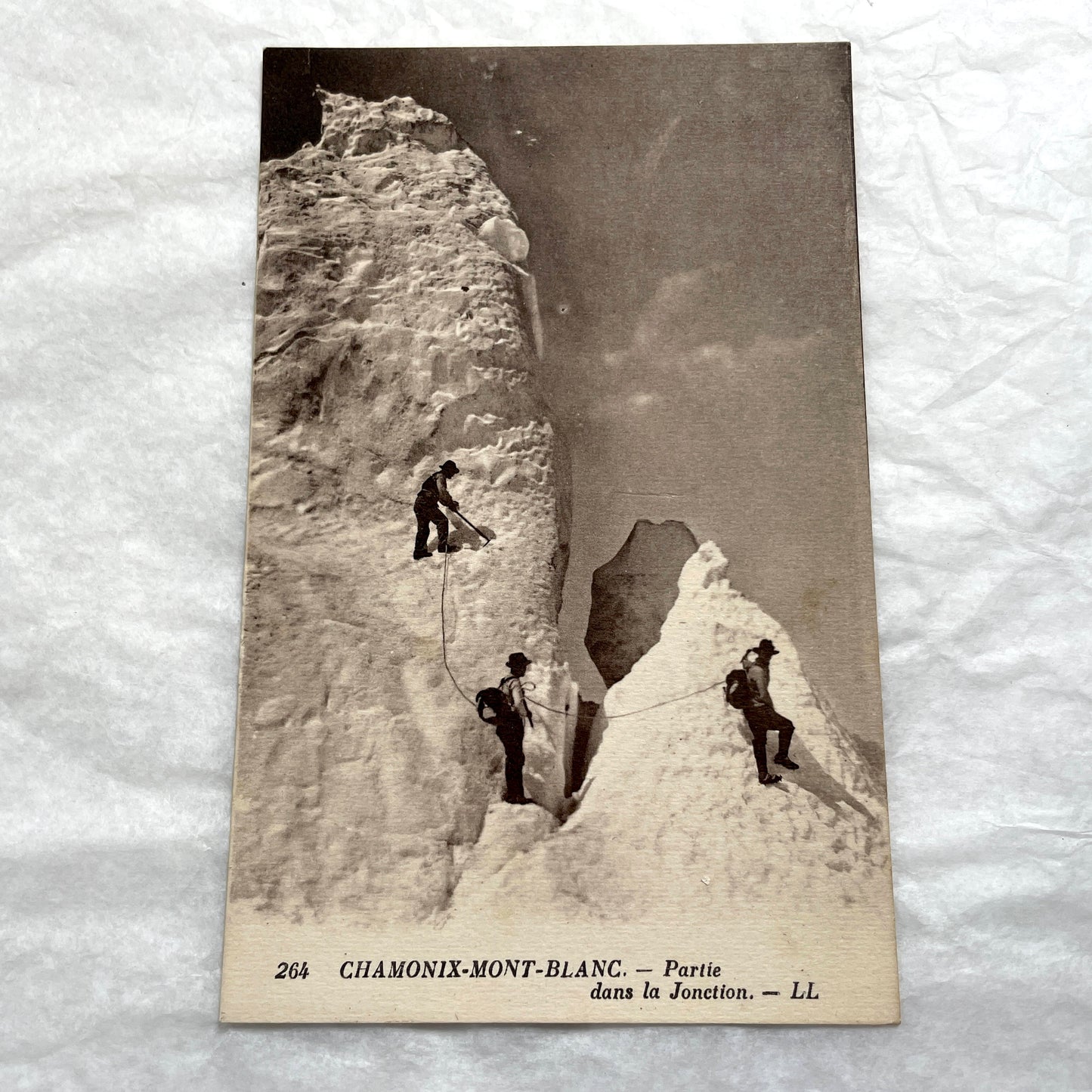 1910s French postcard lot of Chamonix-Mont-Blanc with mountaineers on snow and views of alpine peaks.
