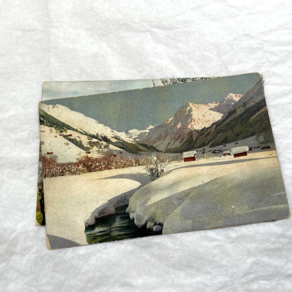 1900s Lot of Four Postcards - Diverse European Landscapes with Seasons, including a castle and snowy mountains.