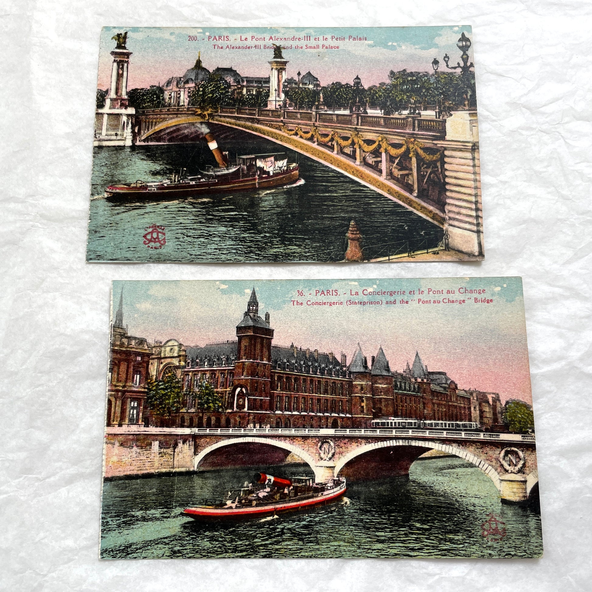 1900s vintage Paris postcards showing Pont Alexandre III and Conciergerie with boats on the Seine River.