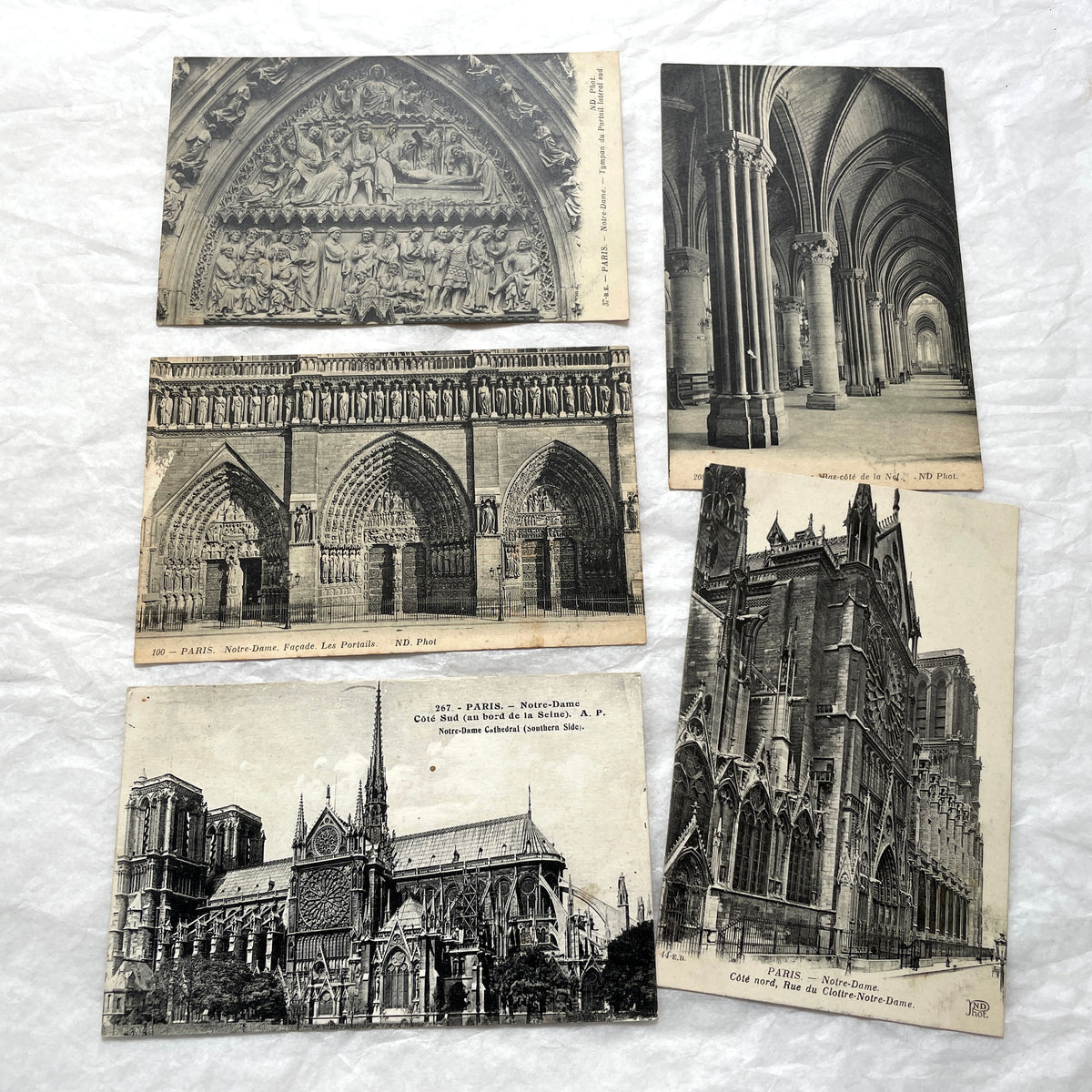 Lot of five 1910s vintage French postcards featuring various architectural details of Notre Dame Cathedral in Paris.