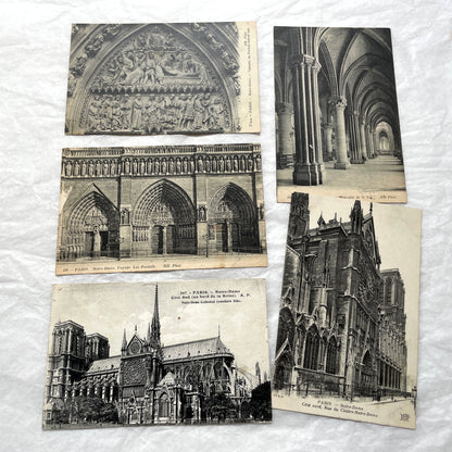 Lot of five 1910s vintage French postcards featuring various architectural details of Notre Dame Cathedral in Paris.