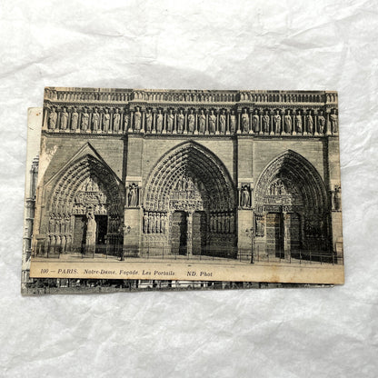 Lot of five 1910s vintage French postcards featuring various architectural details of Notre Dame Cathedral in Paris.