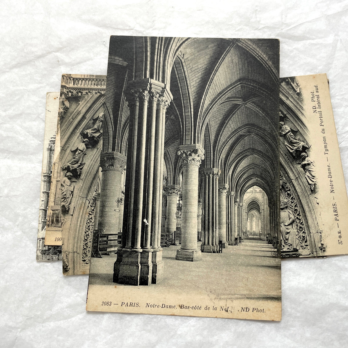 Lot of five 1910s vintage French postcards featuring various architectural details of Notre Dame Cathedral in Paris.