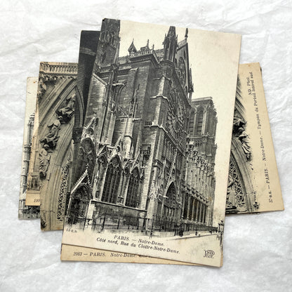 Lot of five 1910s vintage French postcards featuring various architectural details of Notre Dame Cathedral in Paris.