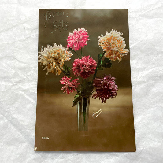 1910s French postcard lot with hand-colored floral bouquets in vases, featuring vintage 'Bonne Année' greetings.